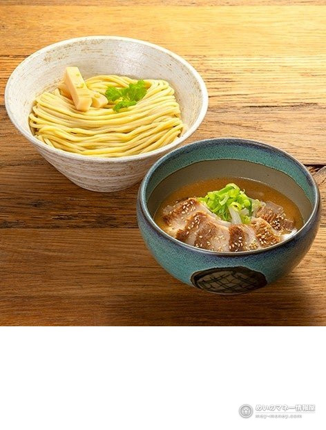 Tsukemen with a bowl of noodles and a dipping soup with chashu pork