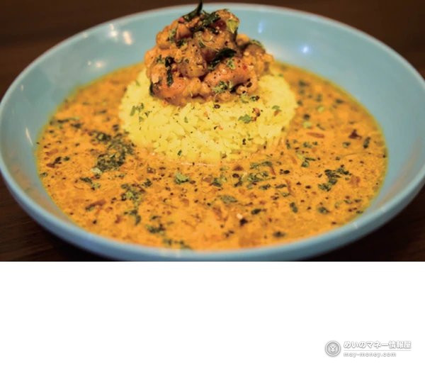 Tokyo Curry Expo at Okubo Park: 48 Shops, ¥600 Roux and ¥400 Rice 6 Yellow-orange curry on a light blue plate with yellow rice and meat