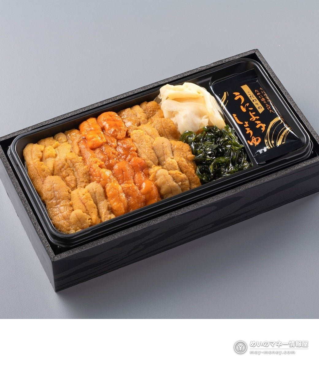 Sea urchin bento in a black box with a small bottle of soy sauce for uni