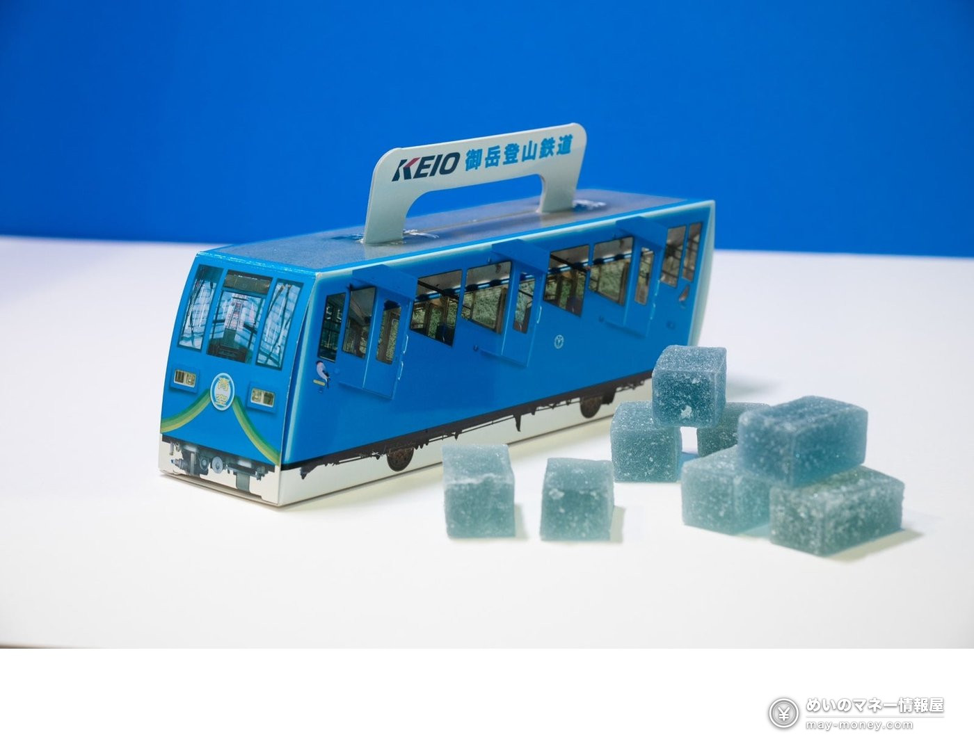 Takaosan Noichi Market at Takaosanguchi Station: Outdoor Gear, Free Talks and Local Beer (Oct 31–Nov 1) 8 A blue box shaped like a cable car with square blue gummy sweets, labelled Keio Mitake Tozan Railway
