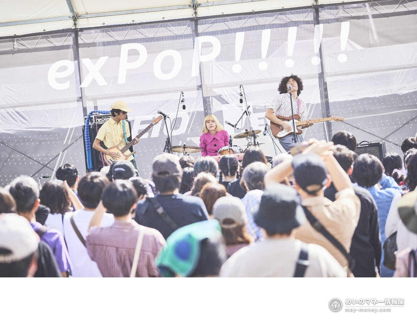 TAMATAMA FESTIVAL 2026: Free Concerts, Food and eSports at Tama Center 2 A three-piece band playing on an outdoor stage in front of an audience at exPoP!!!!!