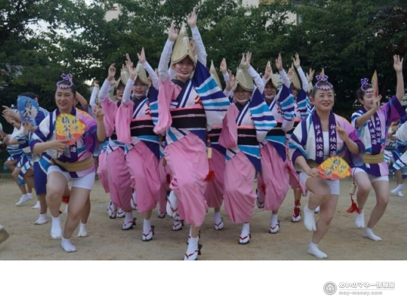 Awa Odori dancers performing in pink costumes