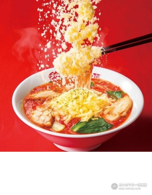 Taiyo no Tomato Men Tomato Matsuri: Get a Free Ramen Coupon With Every Bowl (Oct 9–11) 6 Chopsticks lifting noodles from a cheese-topped tomato ramen with grated cheese falling
