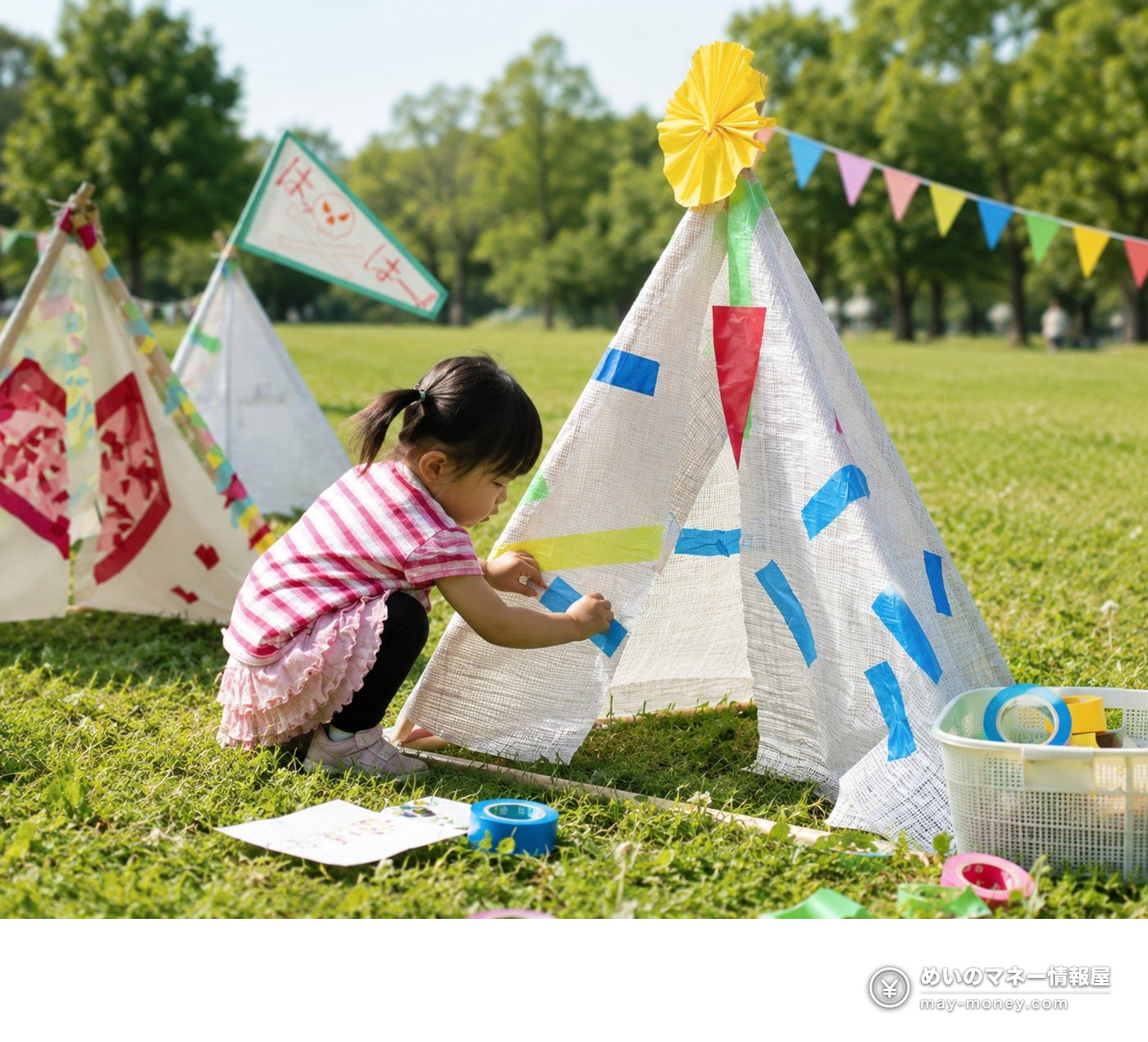 A girl decorating a white teepee tent with tape in a park
