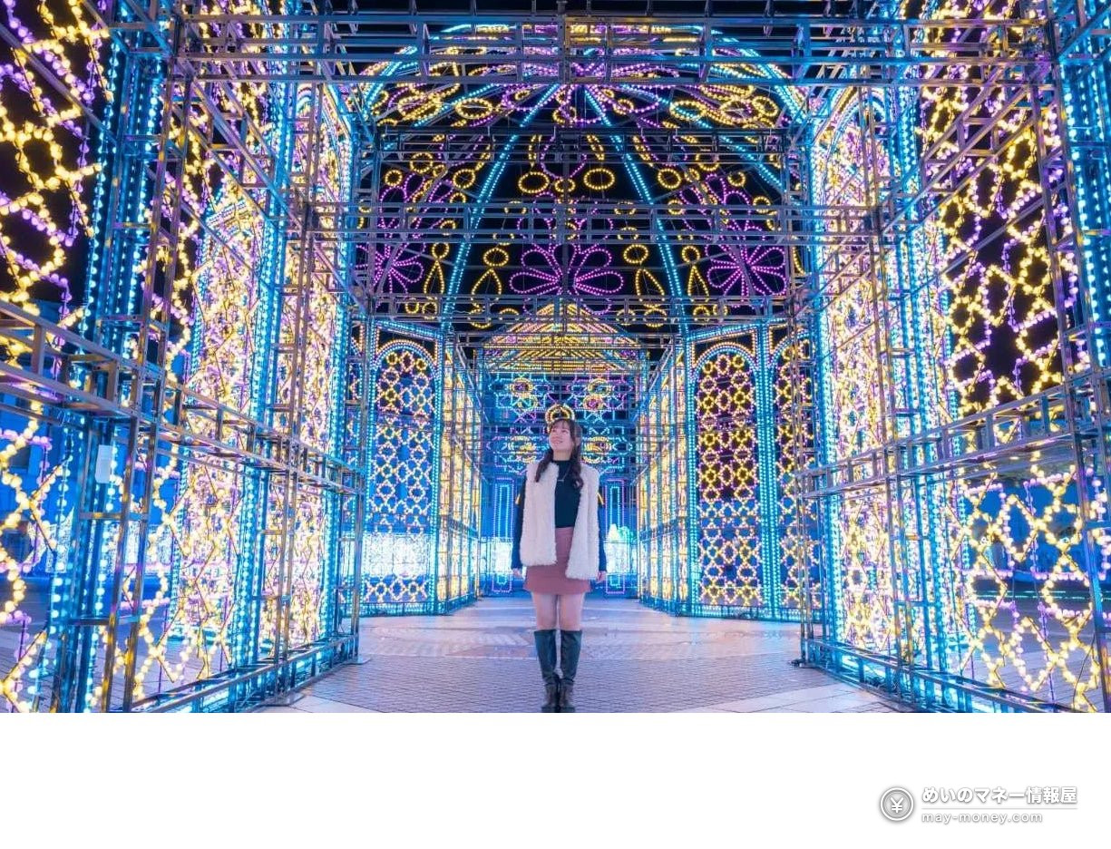 Woman standing in a corridor of yellow and purple lights