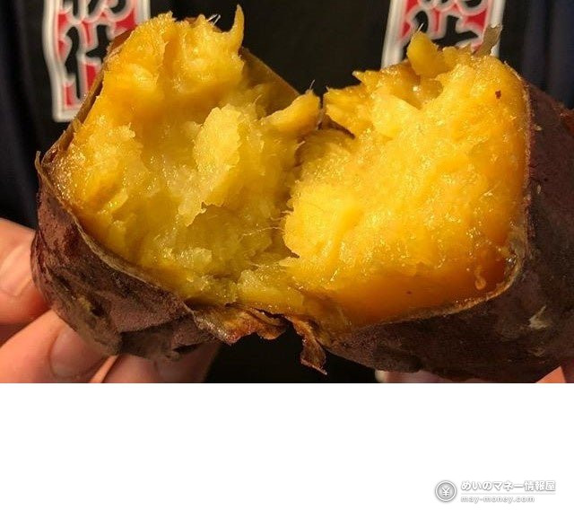 Yakiimo Hiroba at Azabudai Hills: Sweet Potatoes by a Bonfire 3 A roasted sweet potato broken in two by hand, showing orange flesh