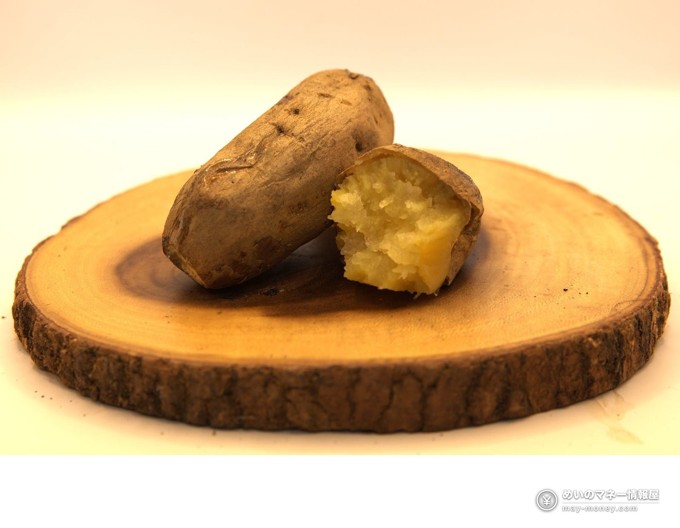 Yakiimo Hiroba at Azabudai Hills: Sweet Potatoes by a Bonfire 6 Roasted sweet potatoes on a wooden board, one cut to show the inside